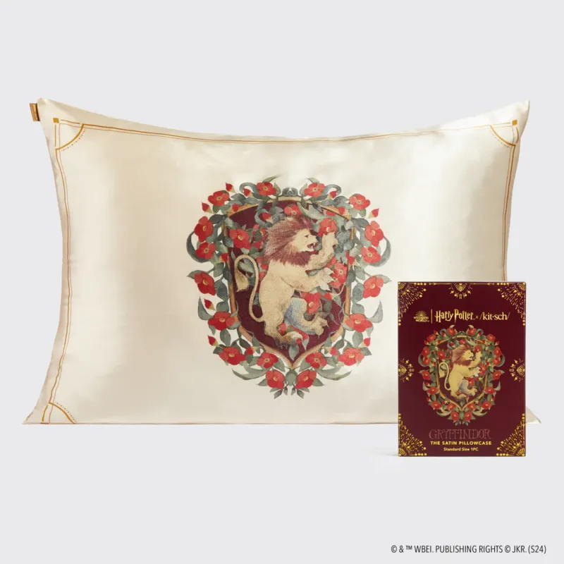Kitsch x Harry Potter Satin Pillowcase in Gryffindor — hero product shot — helps to tame frizz and reduce breakage while sleeping by creating less friction — double-sided satin pillowcase printed with the Gryffindor lion crest