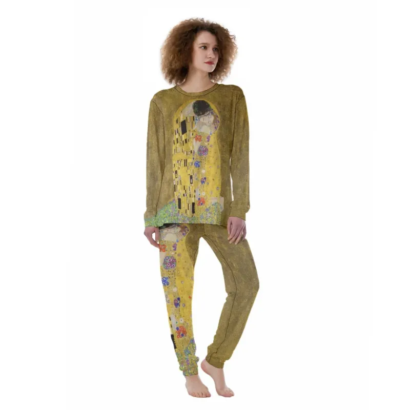 Woman wearing The Kiss by Gustav Klimt women’s long-sleeve pajama set with crew-neck top and cuffed full-length pants